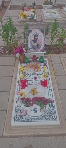 عکس مزار شهید محمد مرصاد مومنی طامه