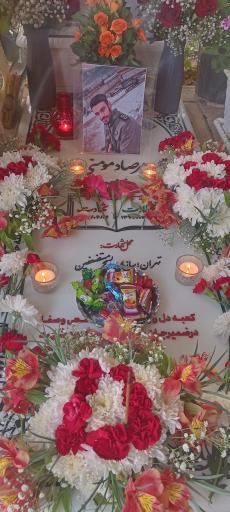 عکس مزار شهید محمد مرصاد مومنی طامه
