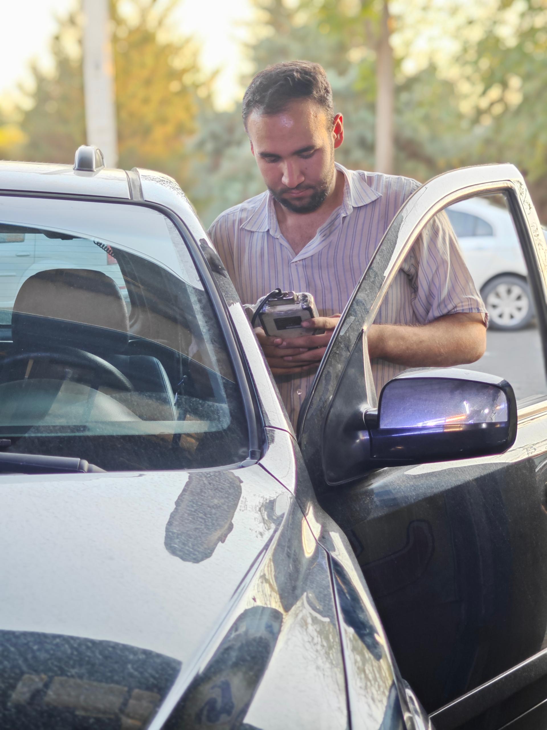 عکس باطری سازی و دیاگ انژکتور فرشید