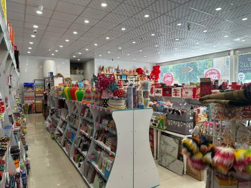 عکس فروشگاه لوازم تحریر افق