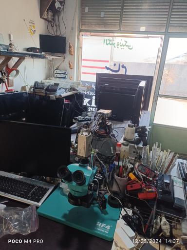 عکس تعمیرات تلویزیون ifix باروق