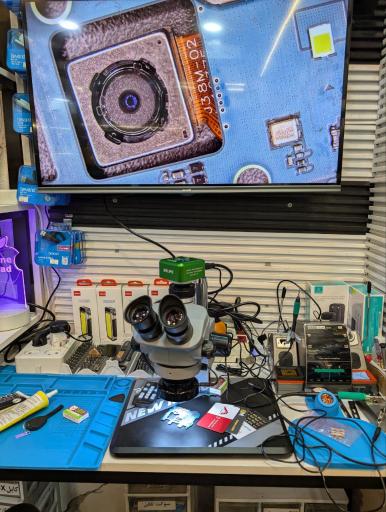 عکس تعمیرات موبایل و نصب بازی کنسول معین