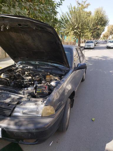 عکس تعمیرگاه پژمان