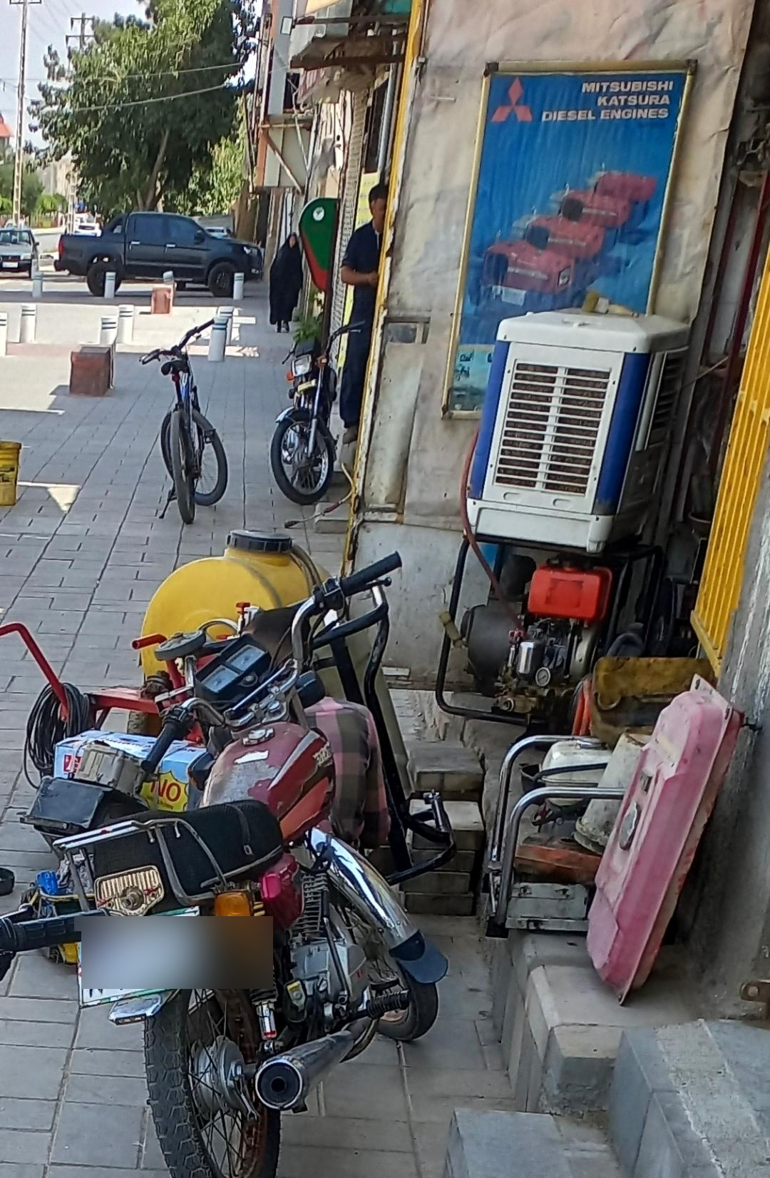 عکس تعمیرگاه موتور برق باغبان