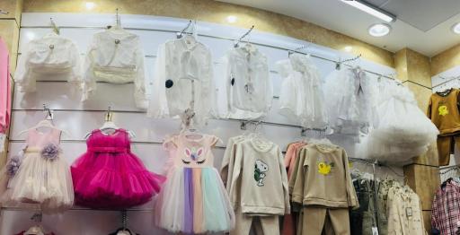 عکس فروشگاه پوشاک بچه گانه شادان 