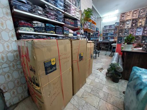 عکس تولید و پخش پوشاک رضا