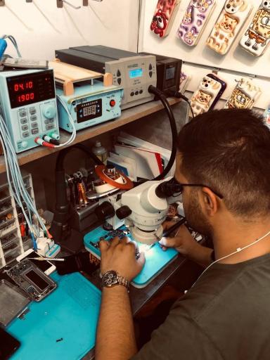 عکس تعمیرات موبایل و لوازم جانبی تهفیکس