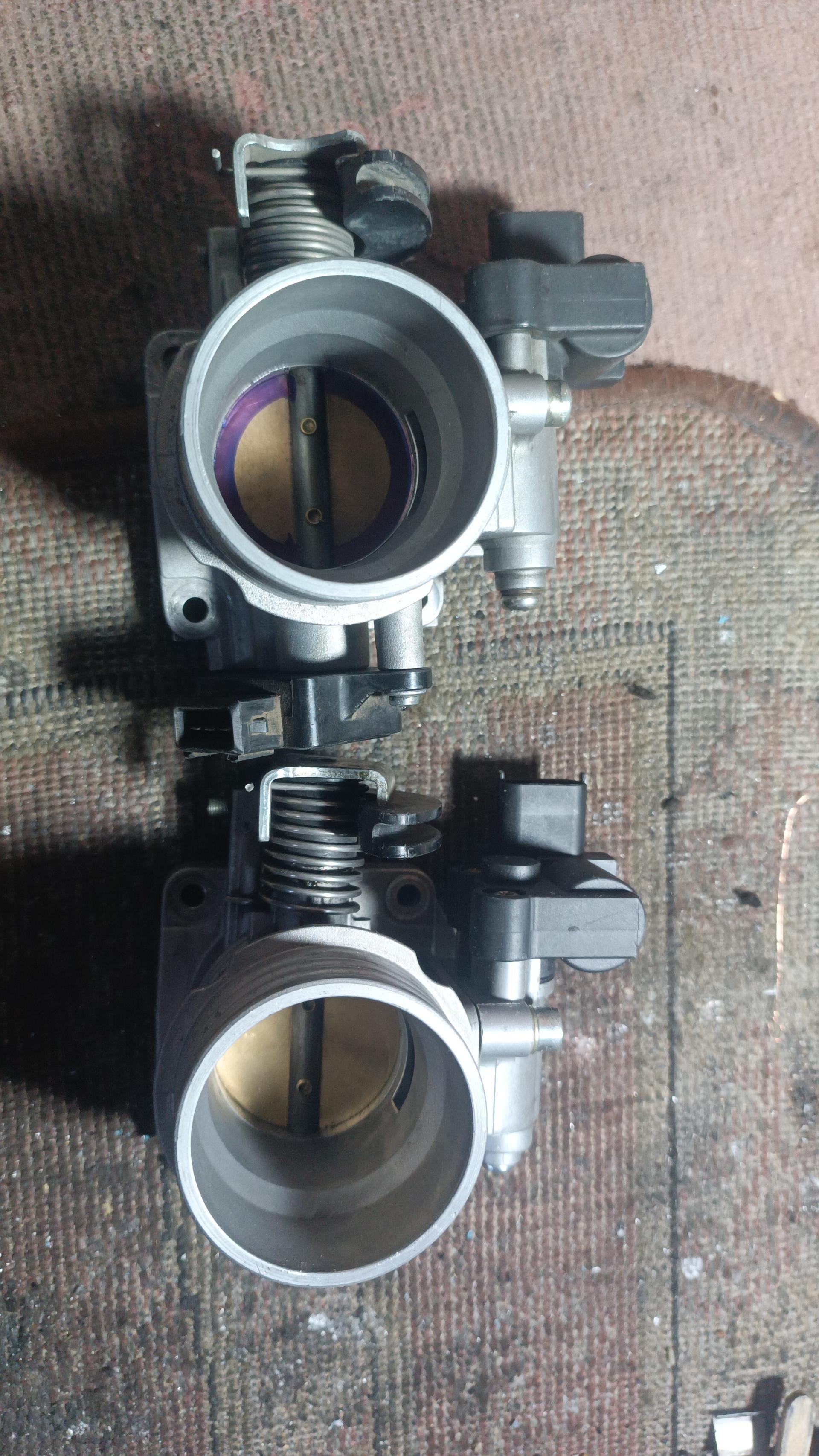 عکس تعمیرات دریچه گاز خودرو علی گلاب