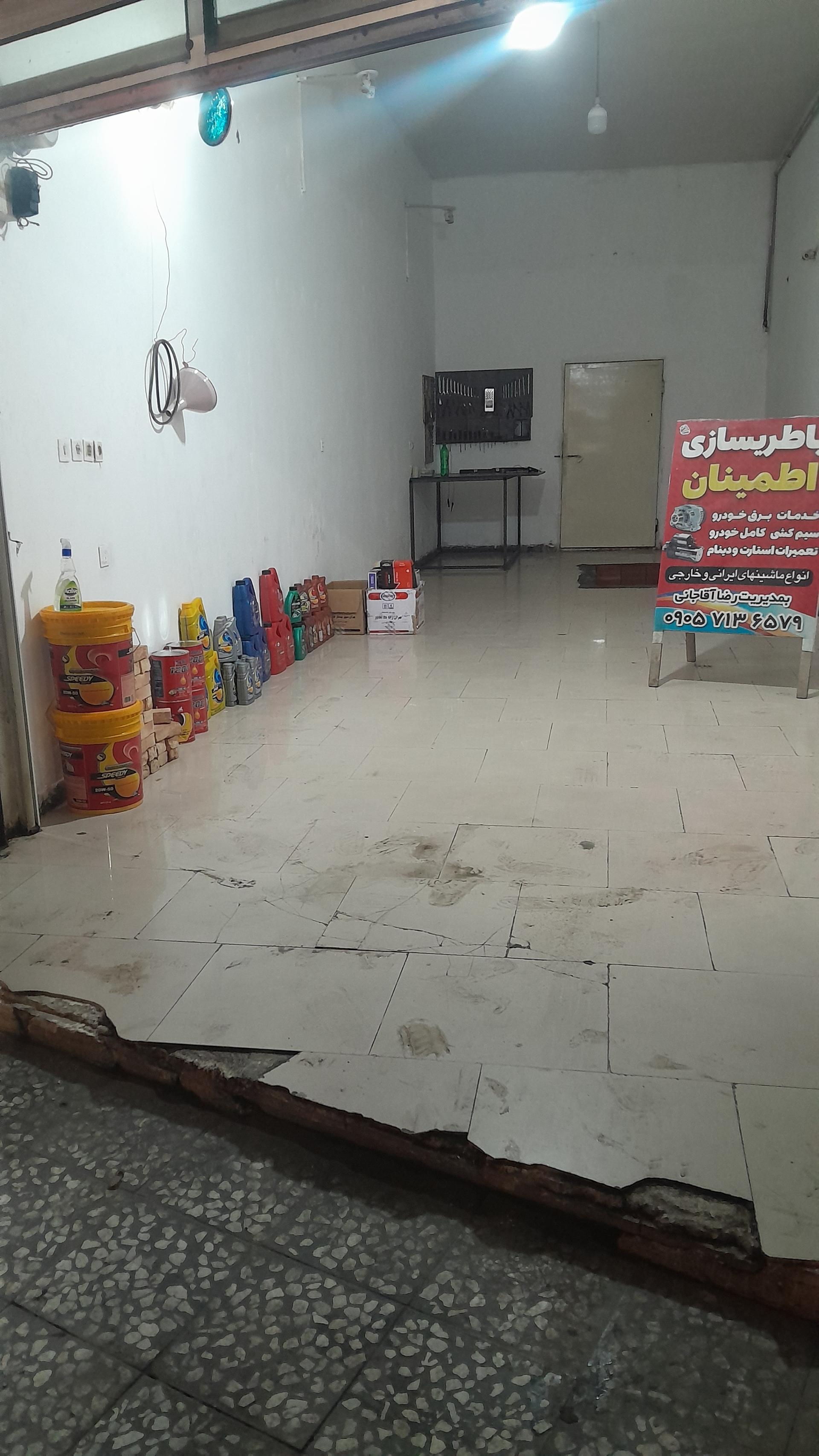 عکس تعویض روغن و باطریسازی اطمینان
