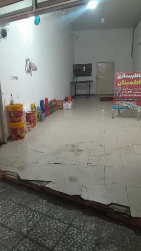 عکس تعویض روغن و باطریسازی اطمینان