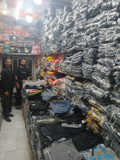 عکس تولید وپخش پوشاک حسینی