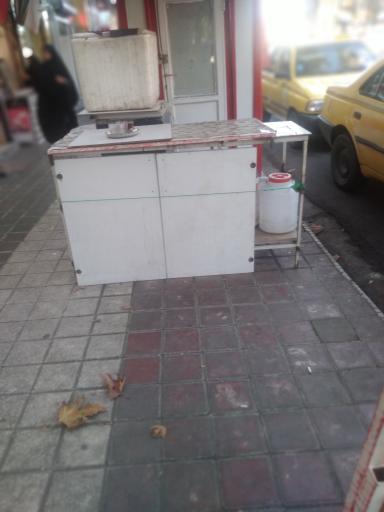 عکس دکه روزنامه فروشی احمد جمالی 