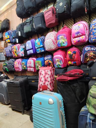 عکس تعمیرات و فروش کیف روز