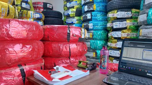 عکس فروش و تعمیر لاستیک آسیا