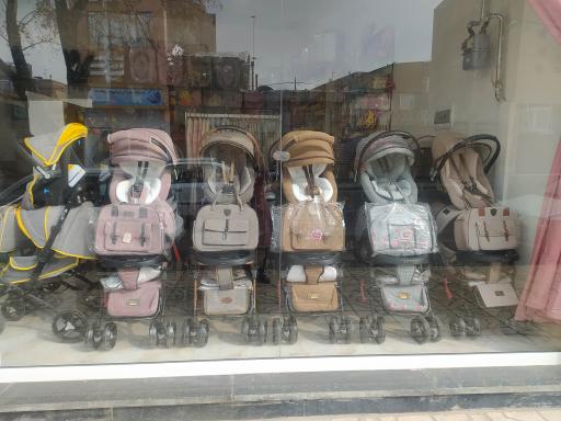 عکس سیسمونی و لباس کودک رنگین کمون