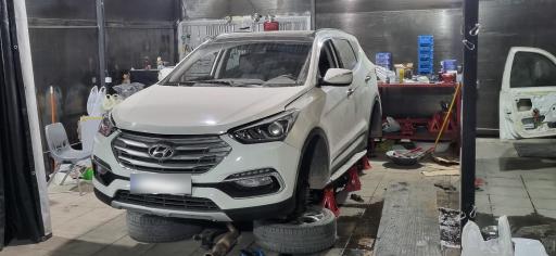 عکس تعمیرگاه تخصصی بیمر لند