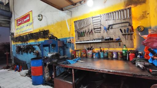 عکس جلوبندی سازی و تعمیر کمک فنر رضا