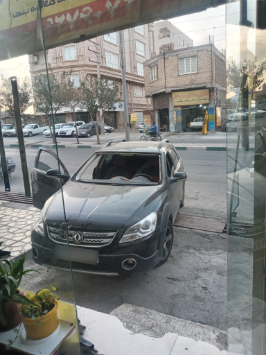 شیشه اتومبیل میرزایی 