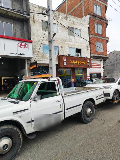 عکس تعمیرگاه عصر جدید