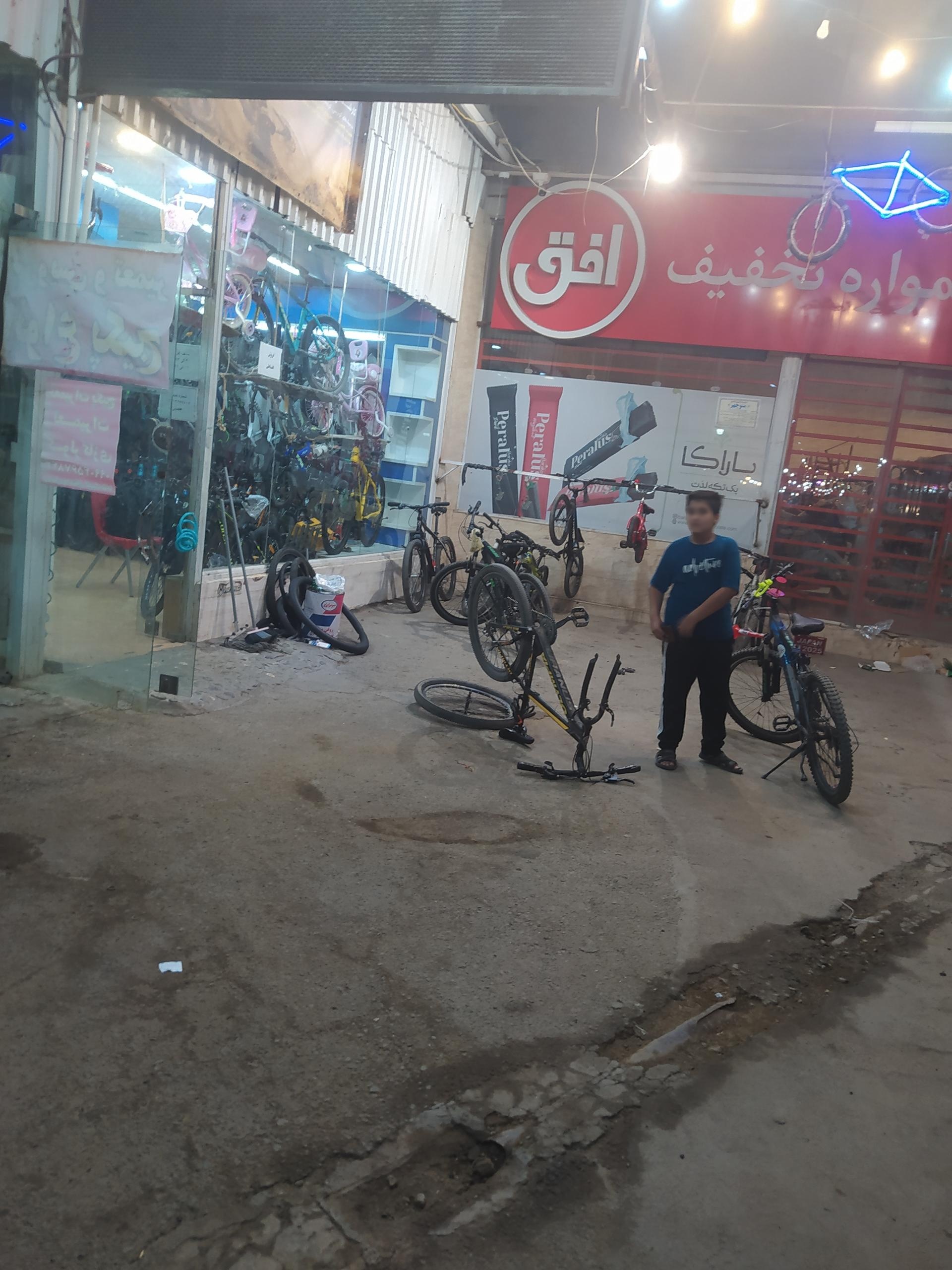 عکس تعمیر دوچرخه عابدینی