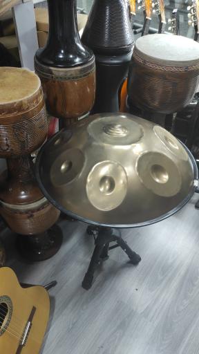 عکس فروشگاه لوازم موسیقی افتخاری