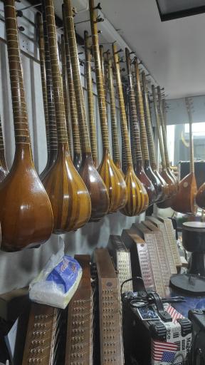 عکس فروشگاه لوازم موسیقی افتخاری