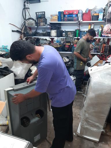 عکس تعمیرگاه لوازم خانگی