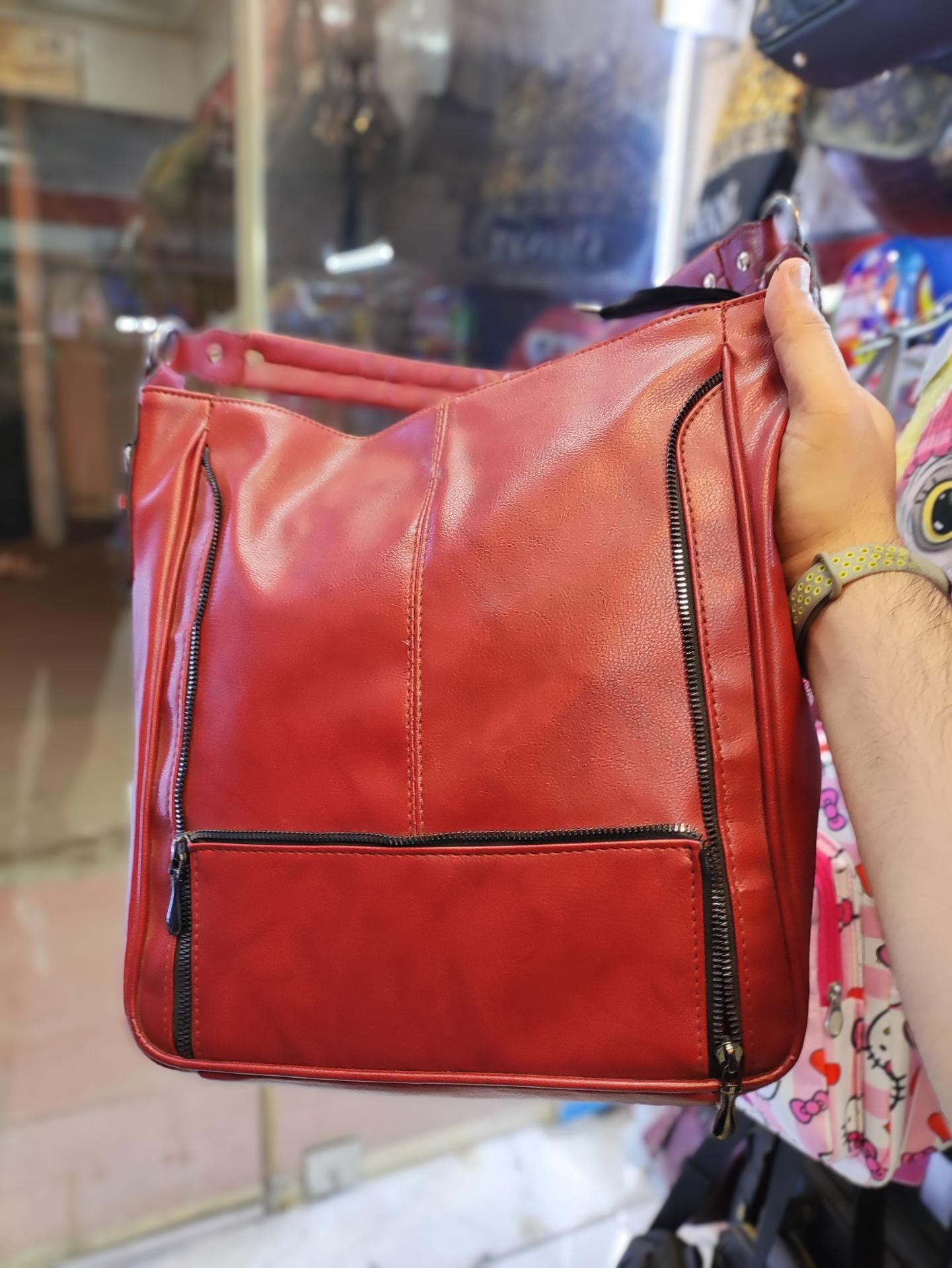 عکس فروشگاه کیف آرامیس