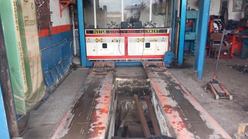 عکس تعمیرگاه و جلوبندی سازی قنبری 