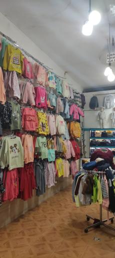 عکس فروشگاه لباس بچگانه آی تک