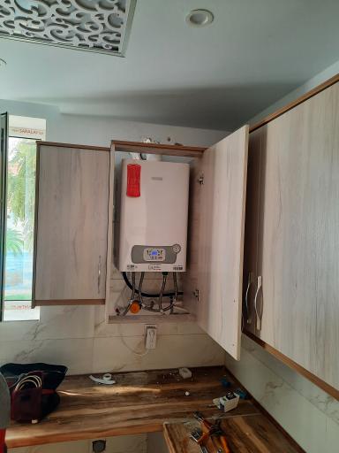 عکس تعمیر آبگرمکن پکیج و تصفیه آب شریفی