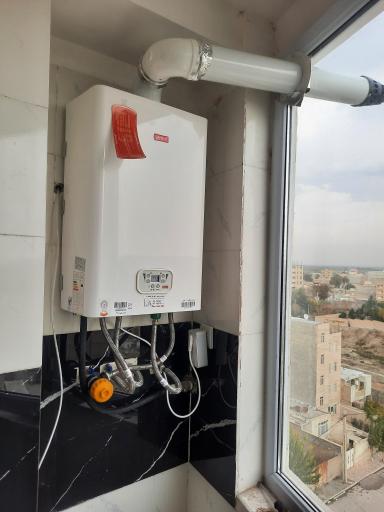 عکس تعمیر آبگرمکن پکیج و تصفیه آب شریفی