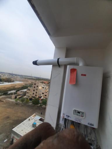 عکس تعمیر آبگرمکن پکیج و تصفیه آب شریفی
