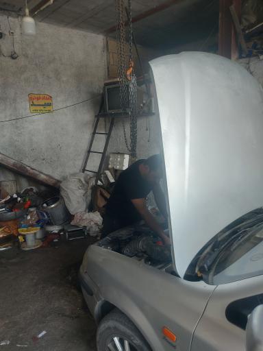 عکس تعمیرگاه مکانیکی پژو 