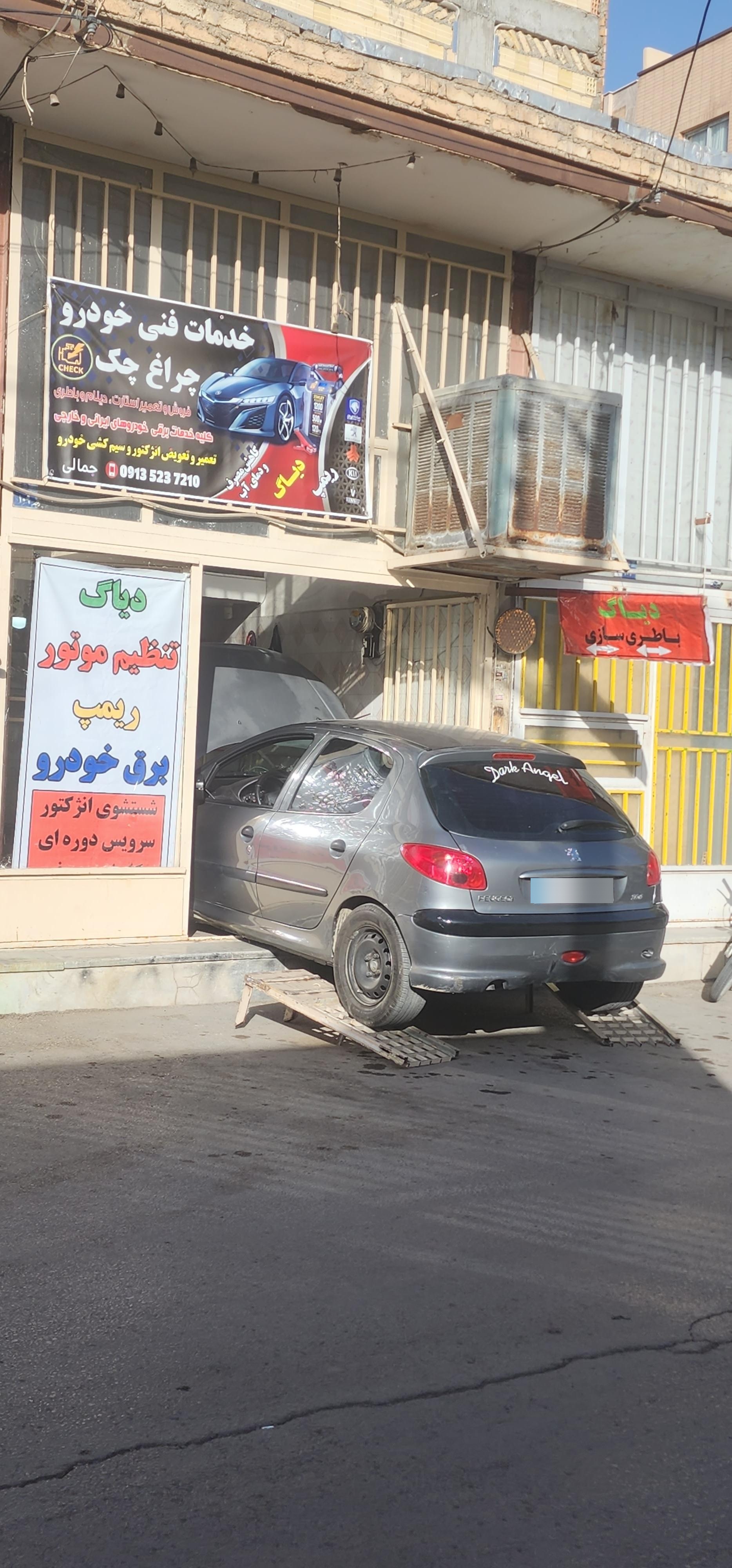 عکس تنظیم موتور و برق خودرو چراغ چک