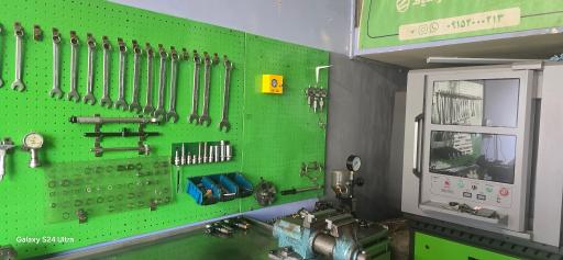 عکس سرویس پمپ و انژکتور دیزل تکنوتک