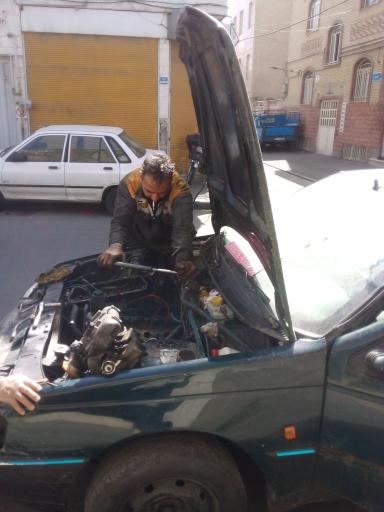 عکس مکانیکی و تعمیرگاه قائم