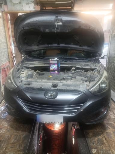 عکس اتوسرویس و تعویض روغنی امید