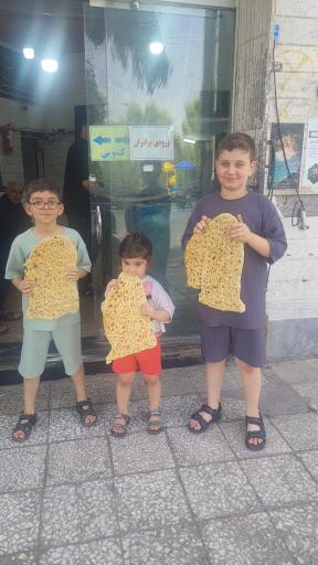 عکس نانوایی سنگکی ماشینی