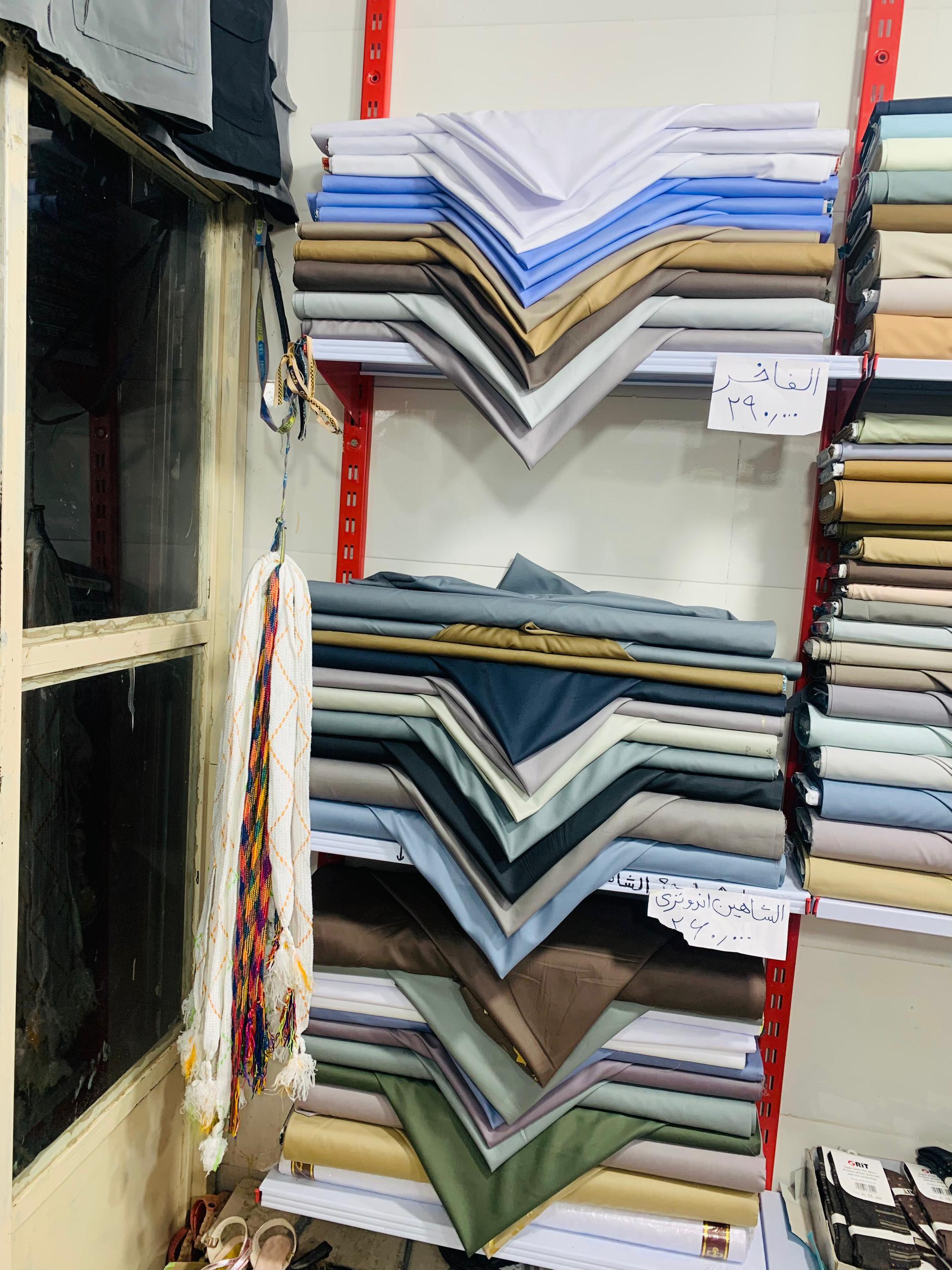 عکس پارچه فروشی و خیاطی مردانه زین العابدین