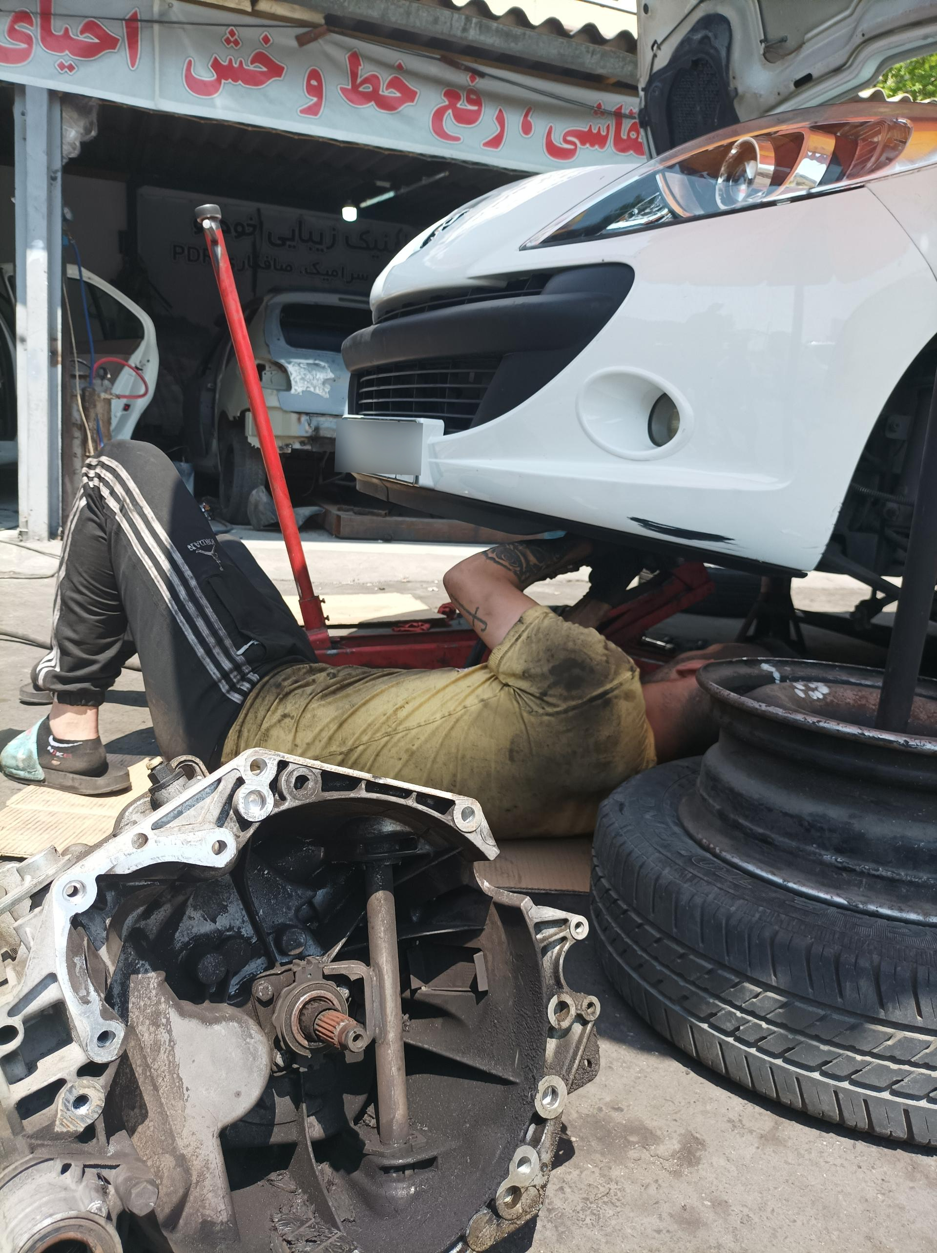 عکس تعمیرگاه و جلوبندی راد