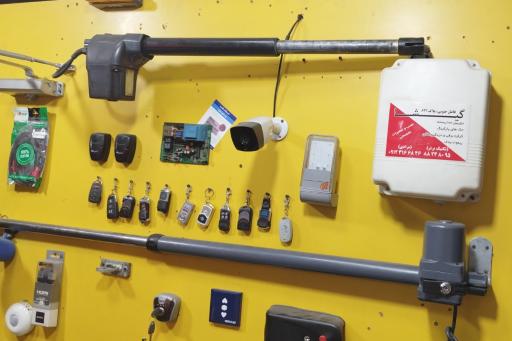 عکس تکنیک برتر (تعمیر جک پارکینگ و کرکره برقی و دوربین)