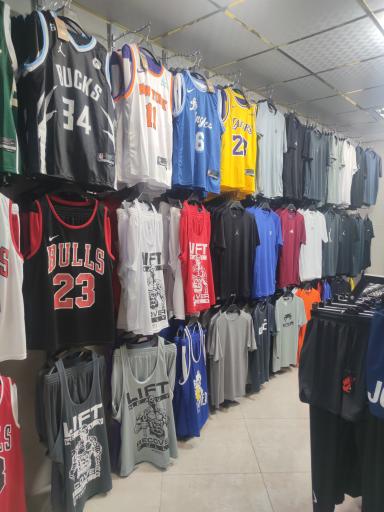 عکس فروشگاه لوازم ورزشی پرشین چمپیون