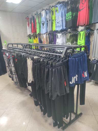 عکس فروشگاه لوازم ورزشی پرشین چمپیون