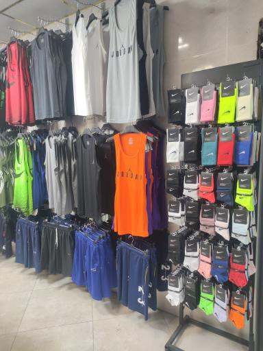 عکس فروشگاه لوازم ورزشی پرشین چمپیون