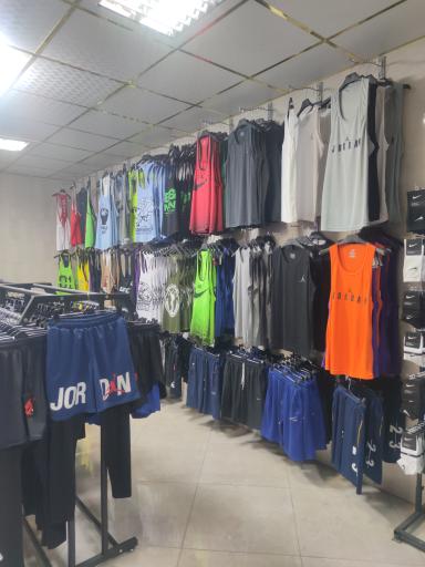 عکس فروشگاه لوازم ورزشی پرشین چمپیون