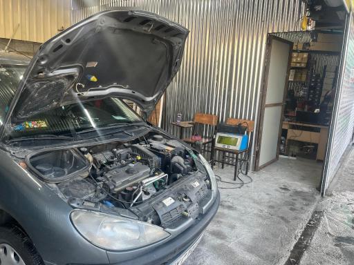 عکس تعمیرگاه معاینه فنی تهران جوان