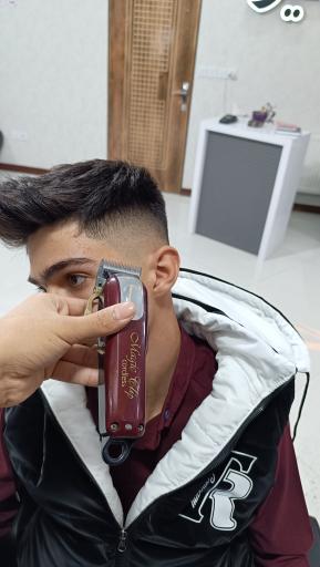 عکس سالن‌ پیرایش اکسیر مردانه