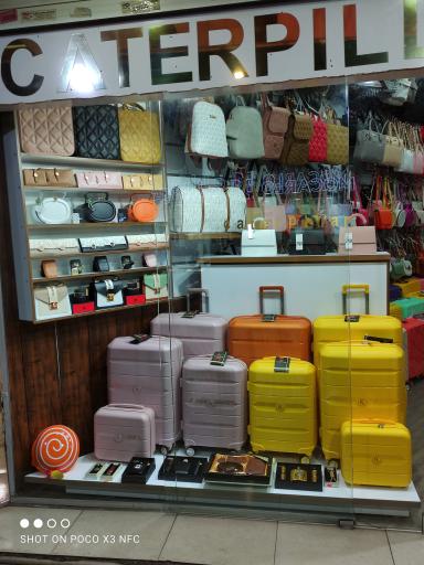 عکس چمدان کیف و کوله کاترپیلار