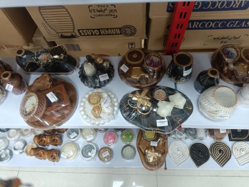 عکس فروشگاه کالادیوم